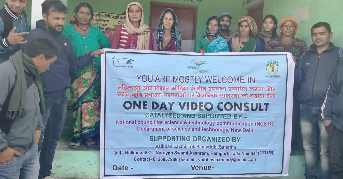 Participants hold a VLLSS banner for a one-day video consult programme.