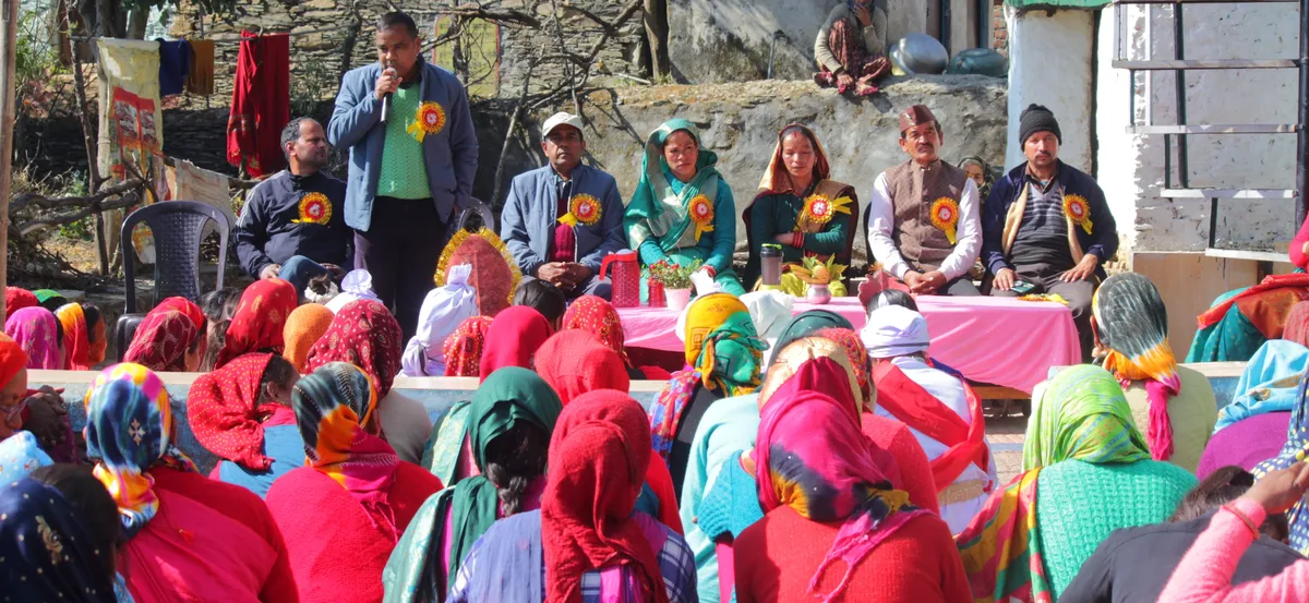 A VLLSS village gathering with local women and community speakers