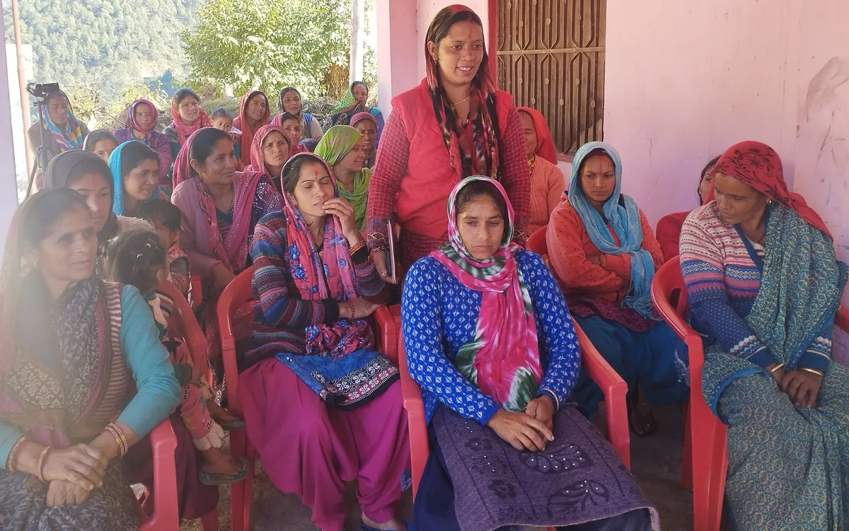 Women participating in a village learning workshop